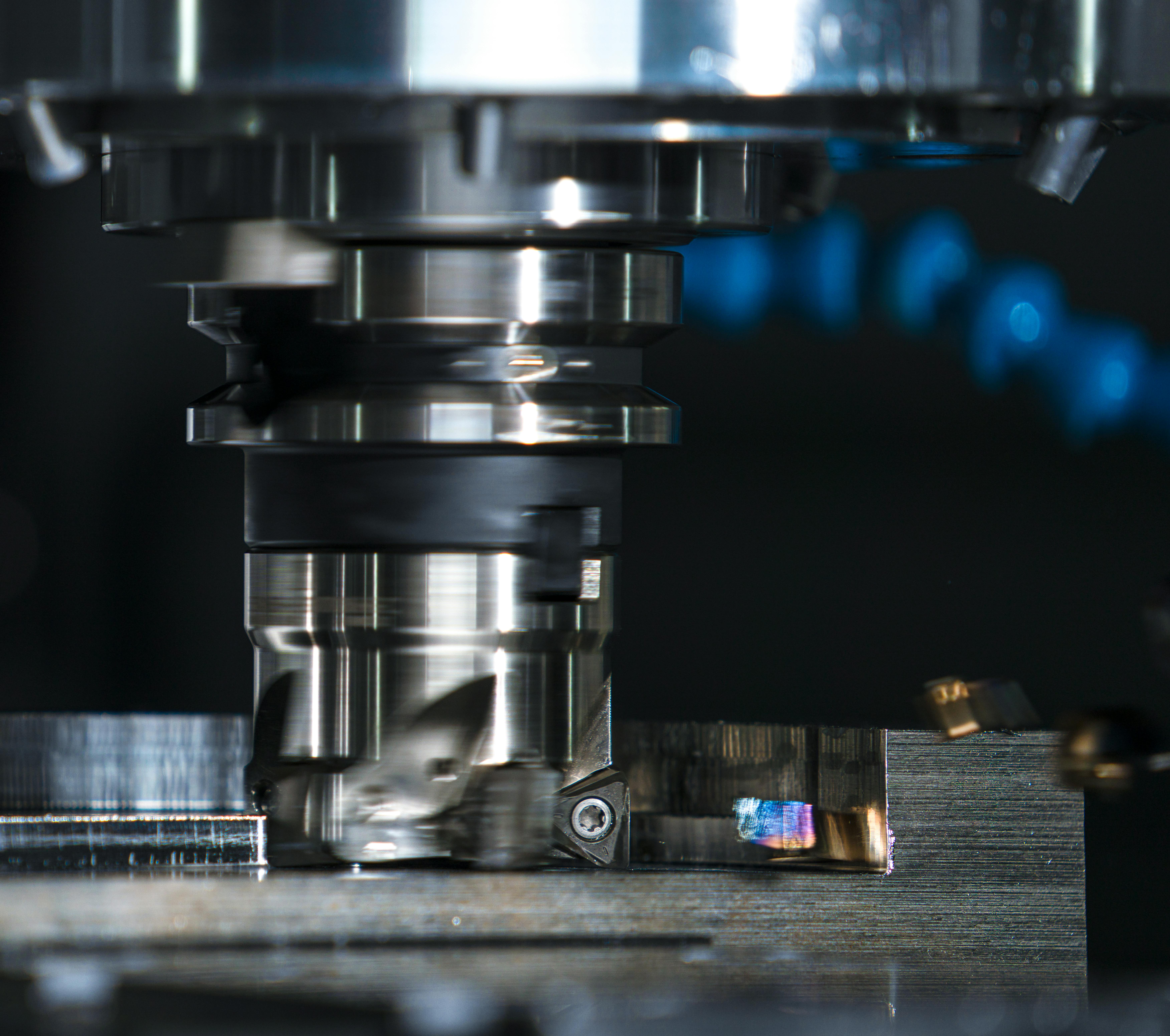 CNC milling cutter machining a metal workpiece